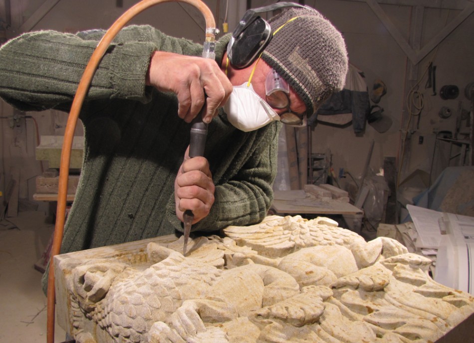 Dale Johnson carving a capital